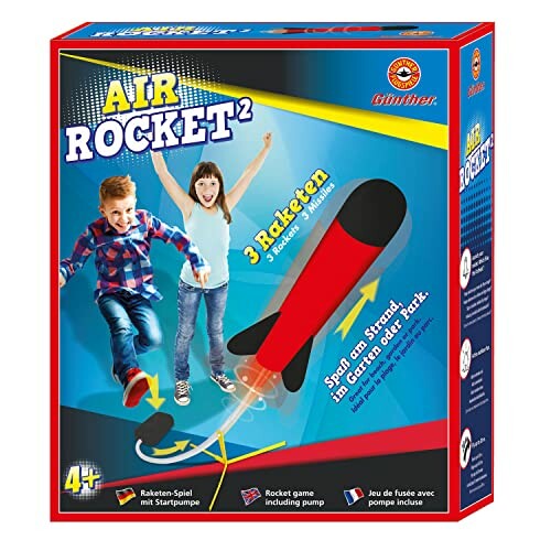 Kinderen spelen met een lucht-raket speelgoedset.