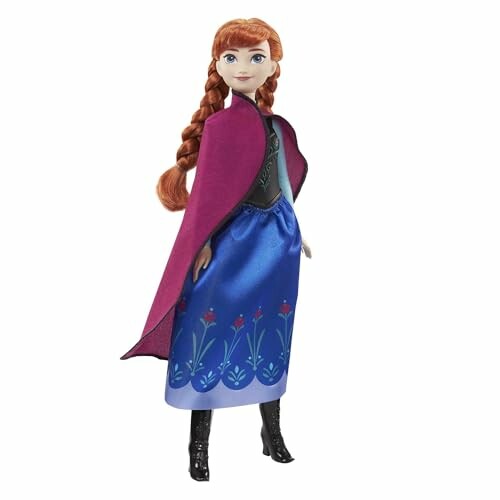 Pop van Anna uit Disney's Frozen met rode cape en blauwe jurk.