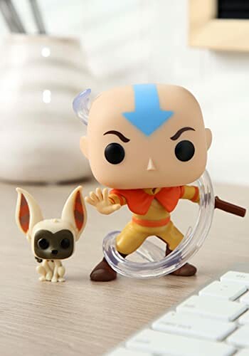 Speelgoedfiguur van Avatar Aang op een bureau