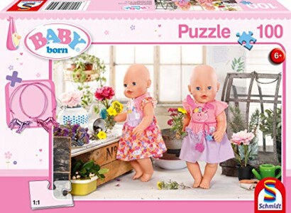 Twee poppen in een bloemenomgeving op een puzzeldoos