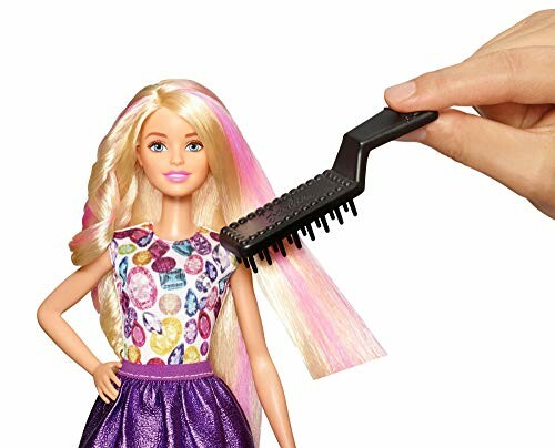 Barbie-pop met roze haar en borstel