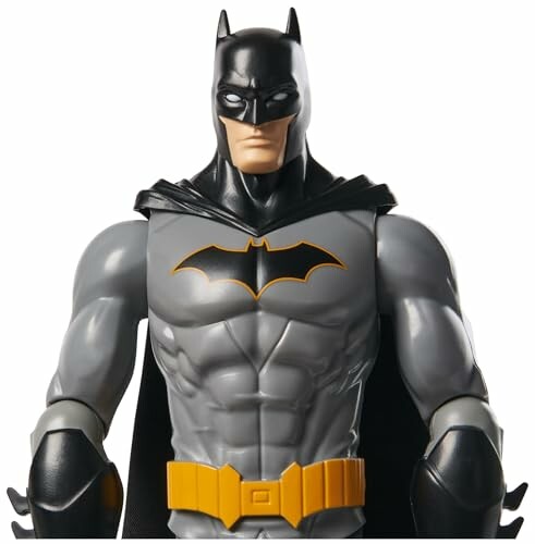 Batman actiefiguur met zwart kostuum en geel riem