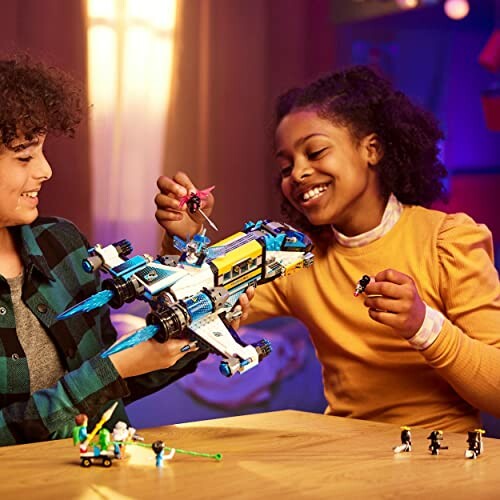 Kinderen spelen met LEGO ruimteschip