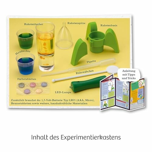 Inhoud van de experimentset met verschillende onderdelen, zoals raketbasis en pipet.