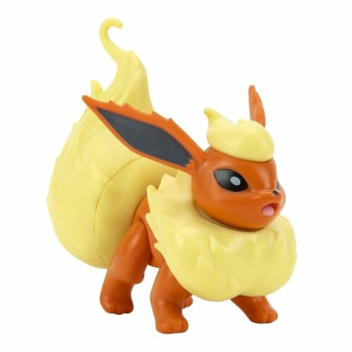 Plastic figuur van een oranje en gele Pokémon