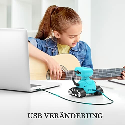 Meisje speelt gitaar met blauwe robot en laptop