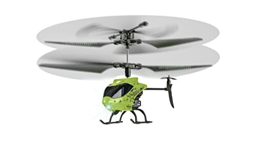 Groene speelgoedhelikopter met draaiende rotorbladen.