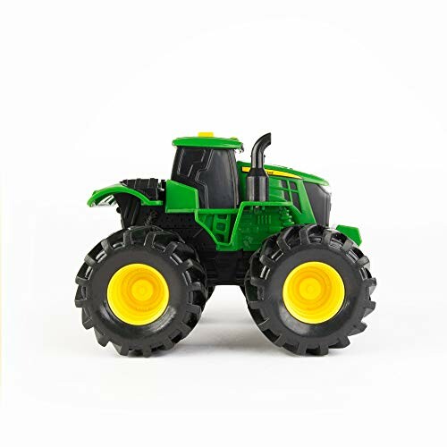 Groene en gele speelgoedtractor