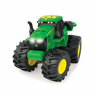 Groene speelgoedtractor met grote banden