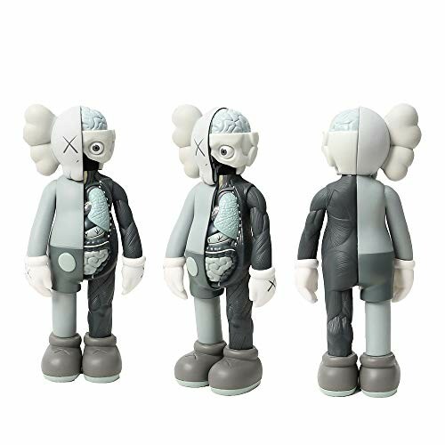 Drie KAWS-figuren met anatomische details