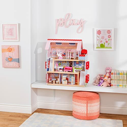 Poppenhuis in speelkamer met speelgoed en boeken