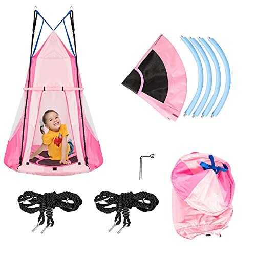 Kind in roze hangtent met accessoires