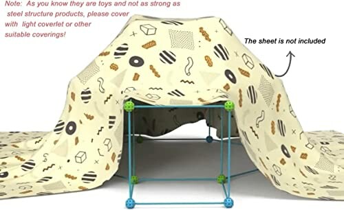 Kinder speeltent structuur met patroon deken.