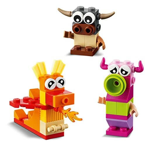 Drie kleurrijke LEGO dierenfiguren