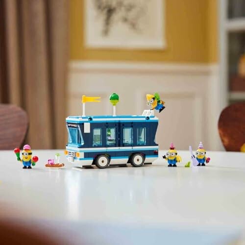 Lego set met een blauwe bus en Minionfiguren