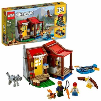 LEGO Creator 3-in-1 pakket met blokhut, kano en dierenfiguren.