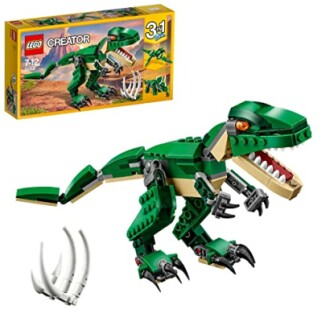 Groene LEGO dinosaurus met bouwset op de achtergrond