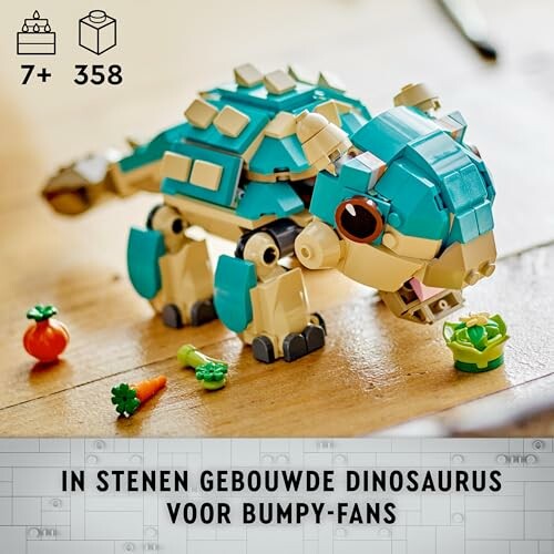 Blauw en beige dinosaurusspeelgoed van stenen