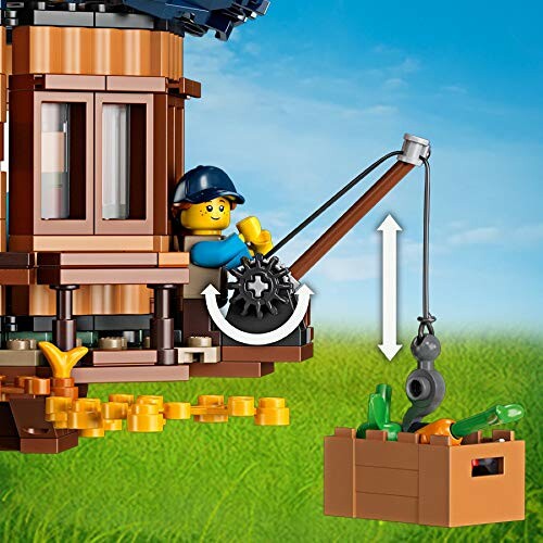 Lego-figuur bedient een kraan met een krat.