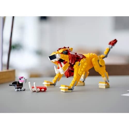 Lego leeuw en hond op een tafel