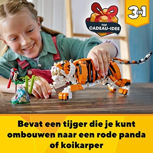 Kind speelt met LEGO tijger en andere bouwsets