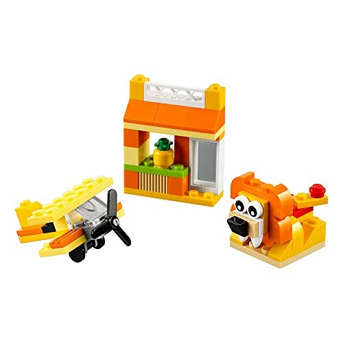 LEGO speelgoedset met vliegtuig, gebouw en leeuw