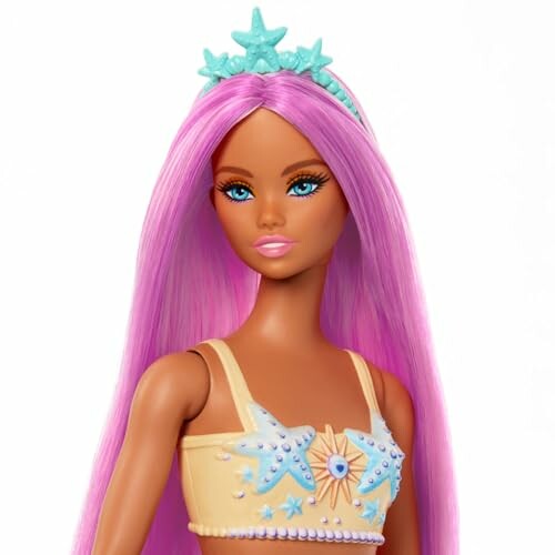 Barbie-pop met roze haar en zeemeerminstijl