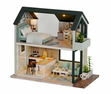 Miniatuur modern poppenhuis met meubels en planten