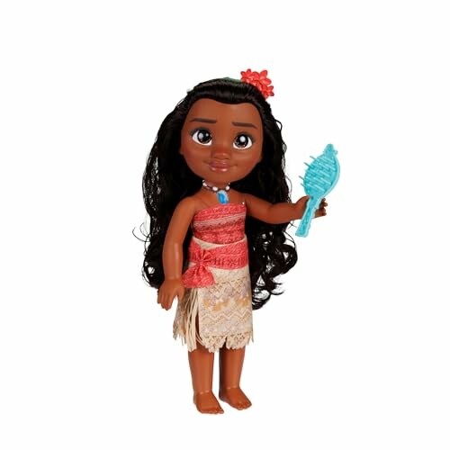 Moana pop met borstel, gekleed in traditionele kleding.