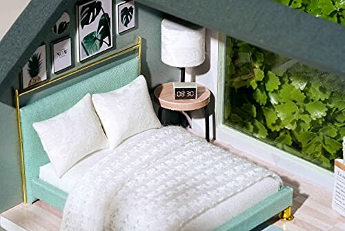 Miniatuur modern slaapkamerinterieur met bed en decor