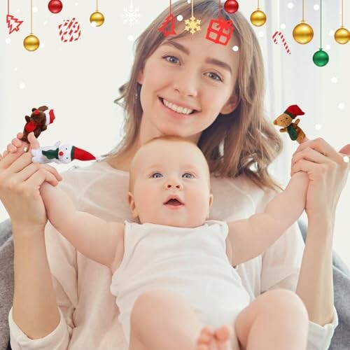 Vrouw met baby en kerstversiering.