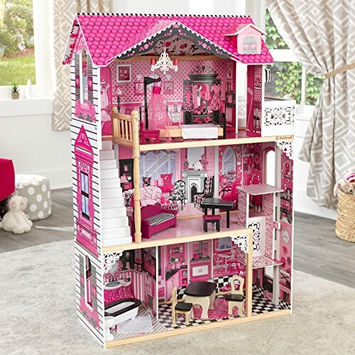 Roze poppenhuis met verschillende kamers en meubels