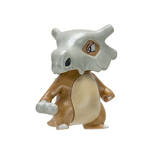 Speelgoedfiguur van Cubone, een Pokémon met een schedelhelm.