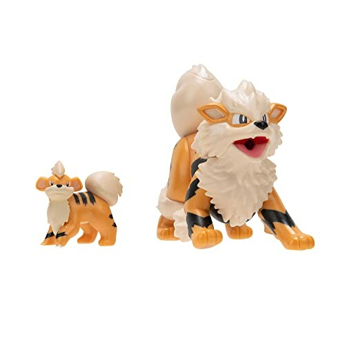 Twee Arcanine speelgoedfiguren van verschillende grootte.