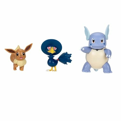 Drie Pokémon-figuren: Eevee, Murkrow en Wartortle.