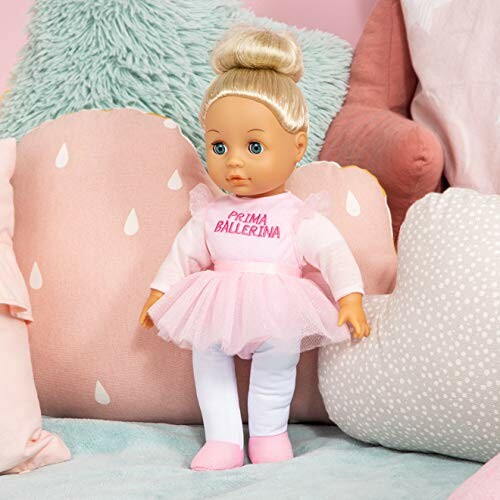 Blonde pop in ballerina outfit op roze kussens