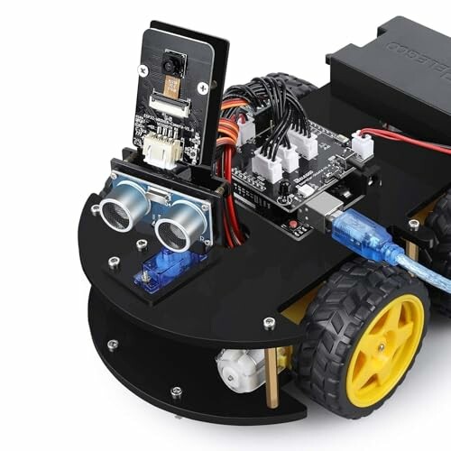 DIY robotautokit met sensoren en bedrading.