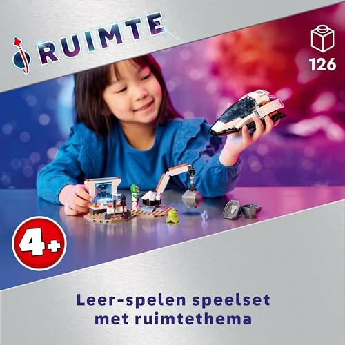 Kind speelt met ruimtespeelset