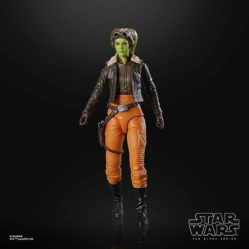 Star Wars actiefiguur van een groene alien in oranje broek