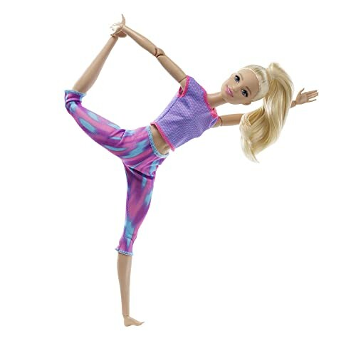 Pop in yoga-pose met kleurrijke kleding.